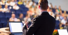 Speaker at Business Conference and Presentation. Speaker at Business Conference and Presentation.