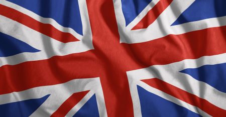 The British Flag Is Flying In The Wind Colorful, National Flag Of Great Britain Patriotism