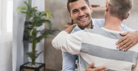 Front View Son Father Hugging Front View Son Father Hugging