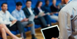 Business Executives Participating In A Business Meeting Business Executives Participating In A Business Meeting
