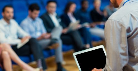 Business Executives Participating In A Business Meeting Business Executives Participating In A Business Meeting